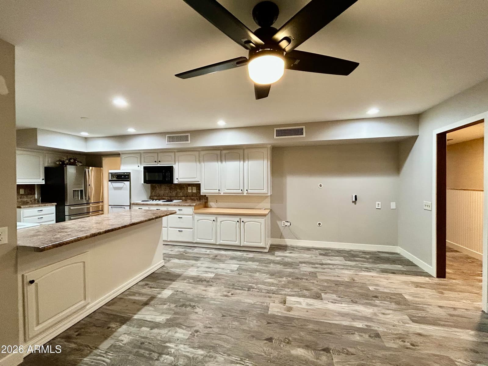 9831 W Wrangler Drive, Sun City, AZ 85373 — photo 9 of 17