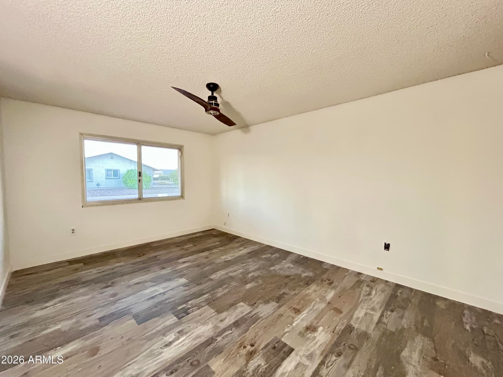 9831 W Wrangler Drive, Sun City, AZ 85373 — photo 10 of 17