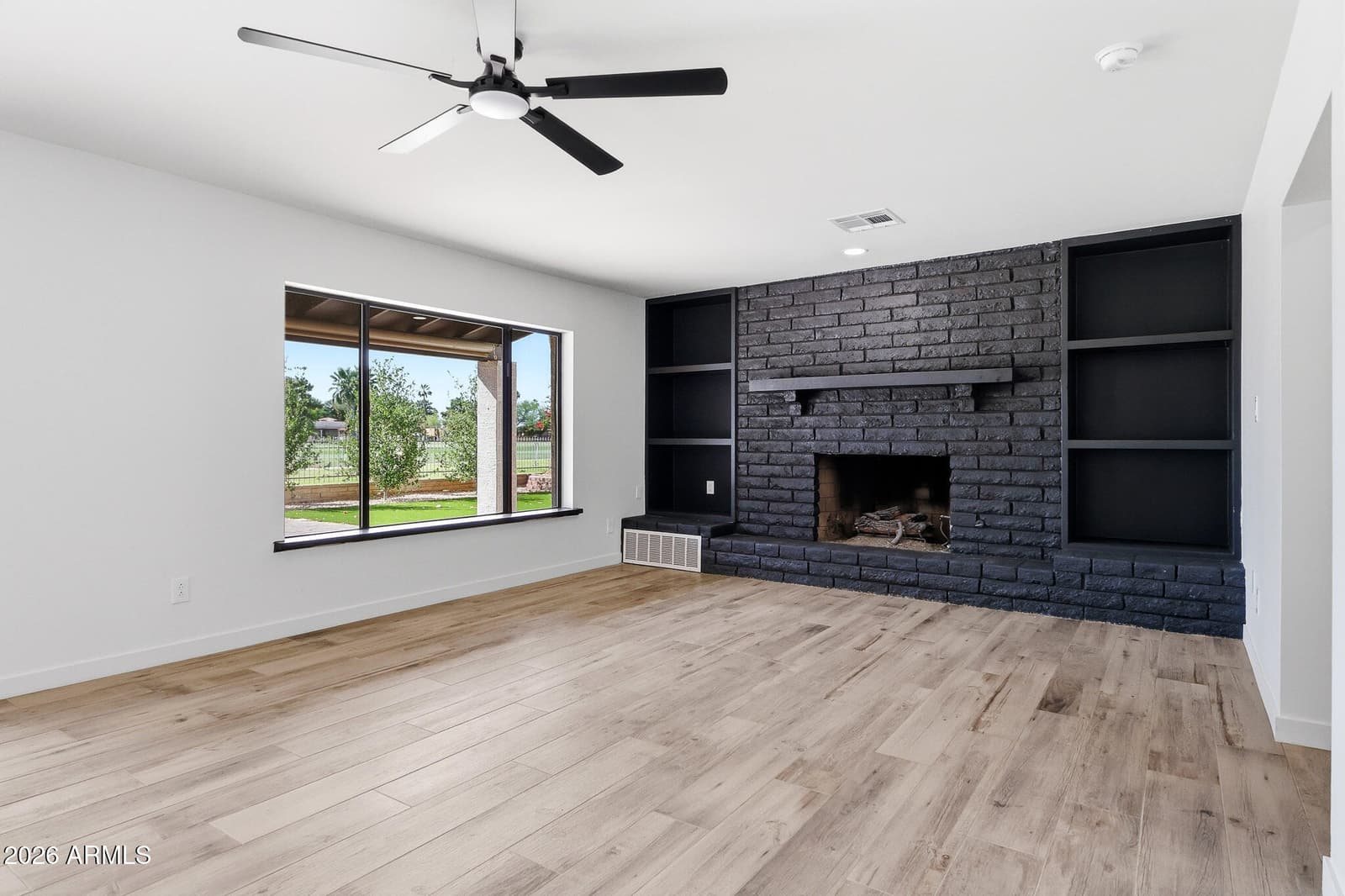 1124 N VILLA NUEVA Drive, Litchfield Park, AZ 85340 — photo 11 of 46
