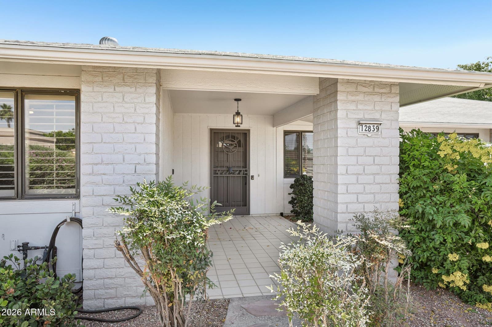 12839 W BLUE BONNET Drive, Sun City West, AZ 85375 — photo 4 of 48