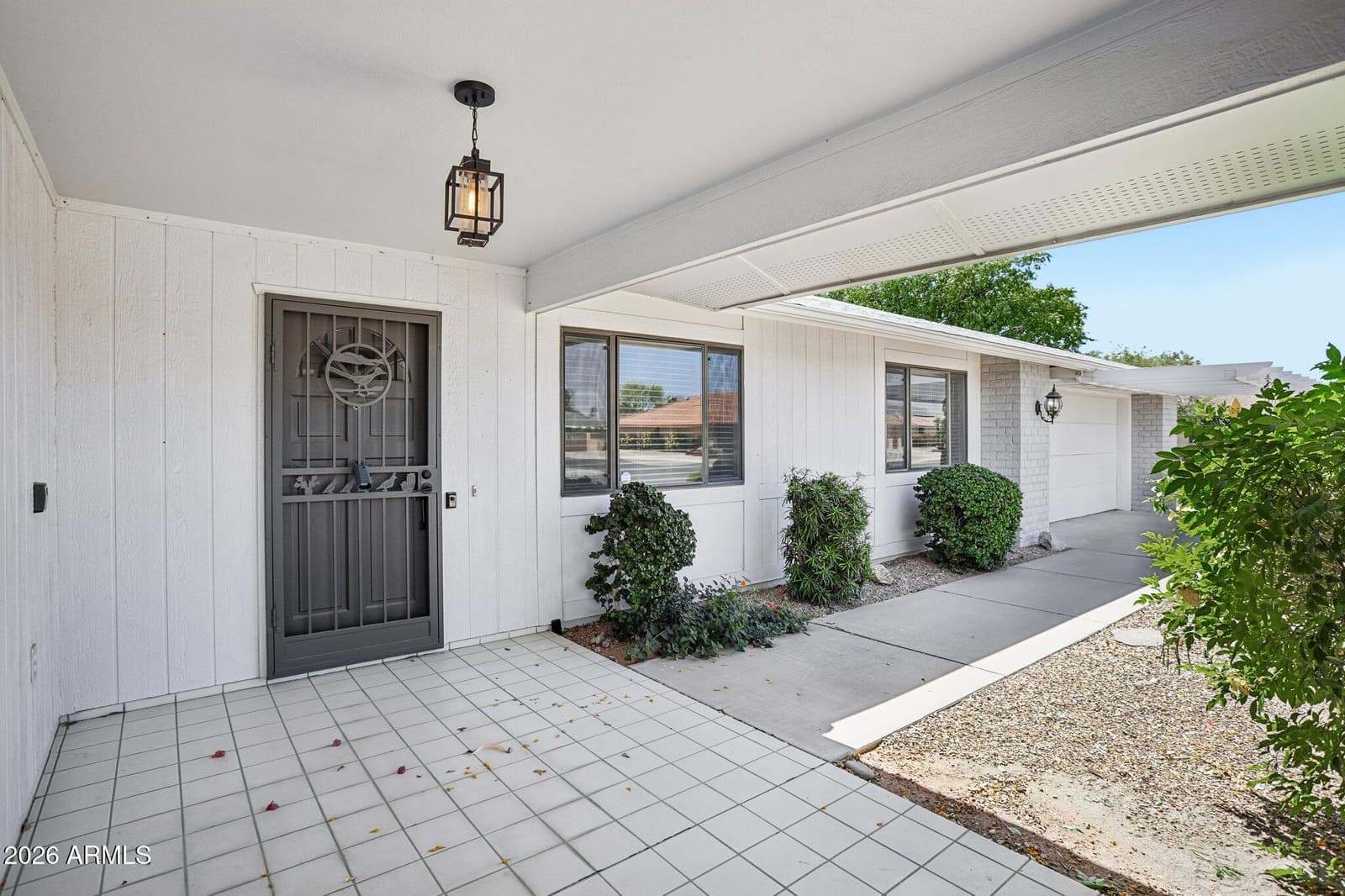 12839 W BLUE BONNET Drive, Sun City West, AZ 85375 — photo 5 of 48