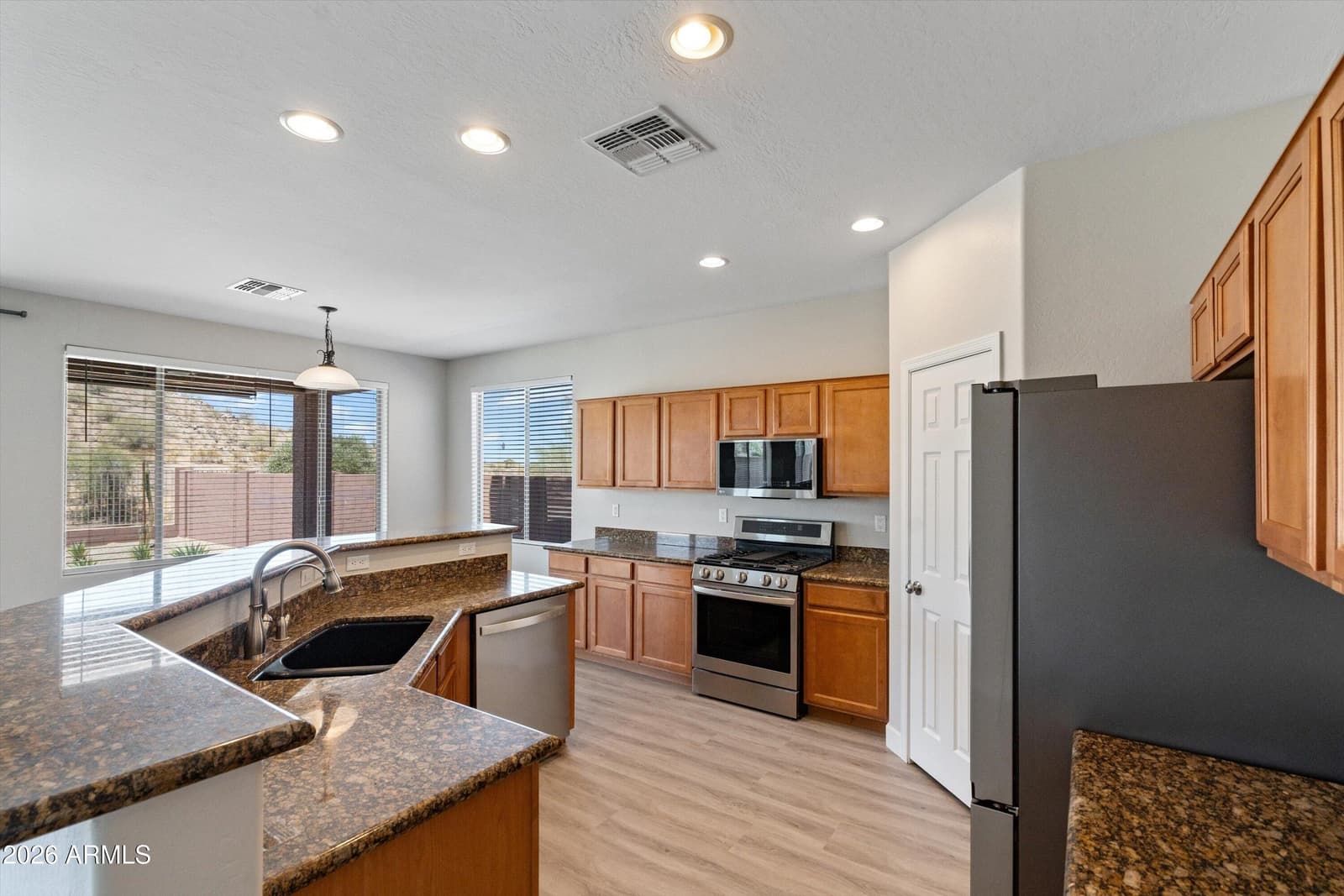 18475 W SWEET ACACIA Drive, Goodyear, AZ 85338 — photo 10 of 64