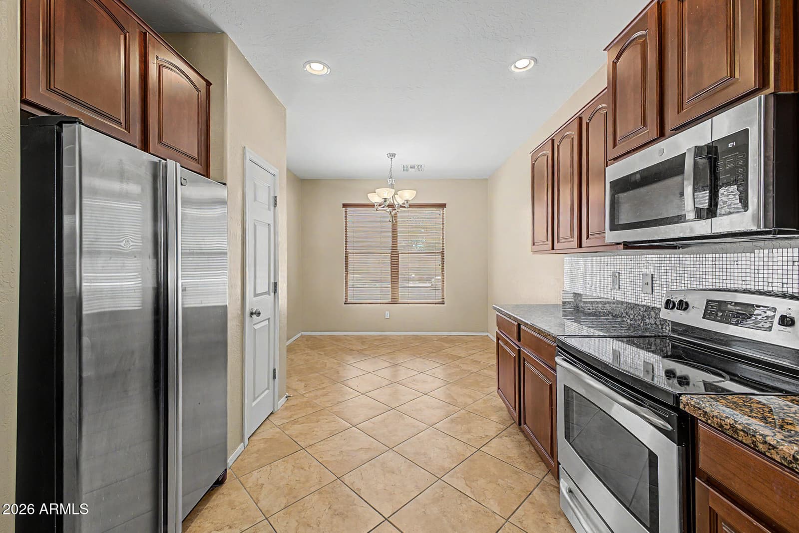 4426 W BURGESS Lane, Laveen, AZ 85339 — photo 10 of 29