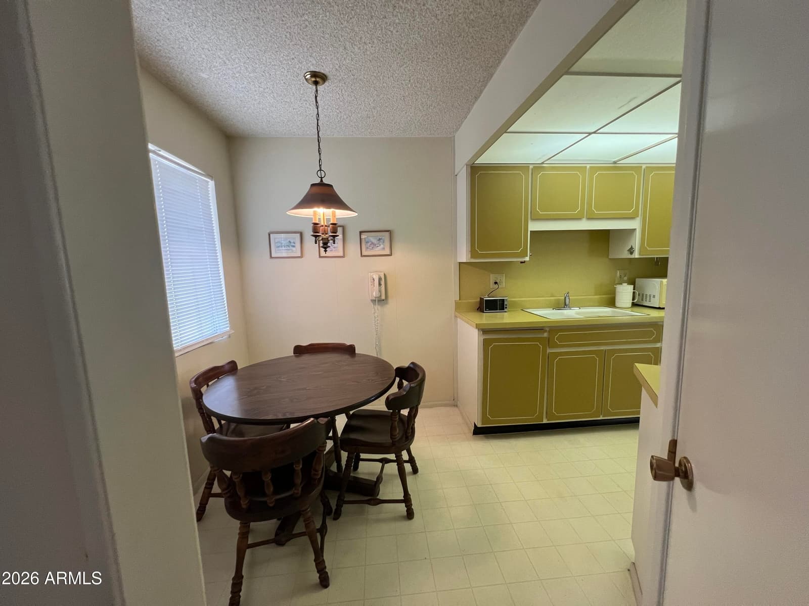 10936 W COGGINS Drive, Sun City, AZ 85351 — photo 11 of 42