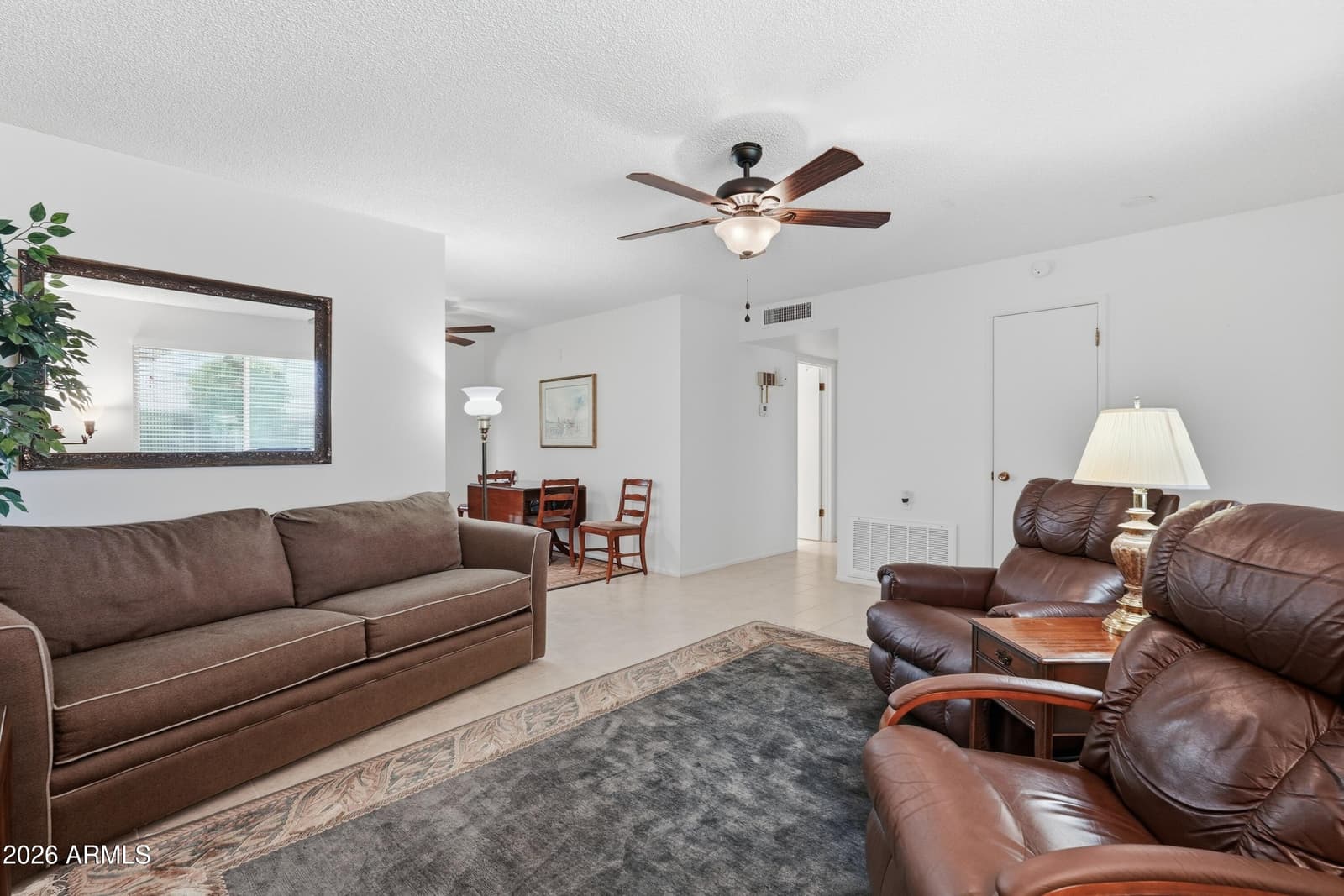 10869 W Clair Drive, Sun City, AZ 85351 — photo 9 of 36