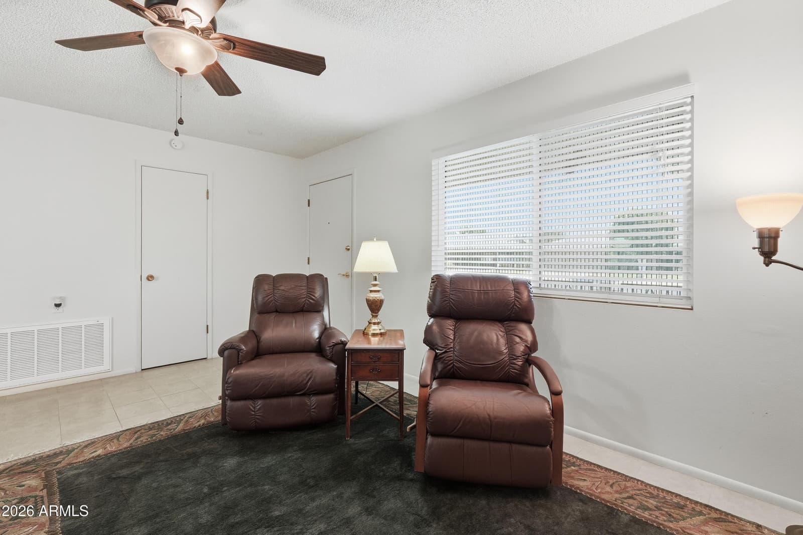 10869 W Clair Drive, Sun City, AZ 85351 — photo 10 of 36