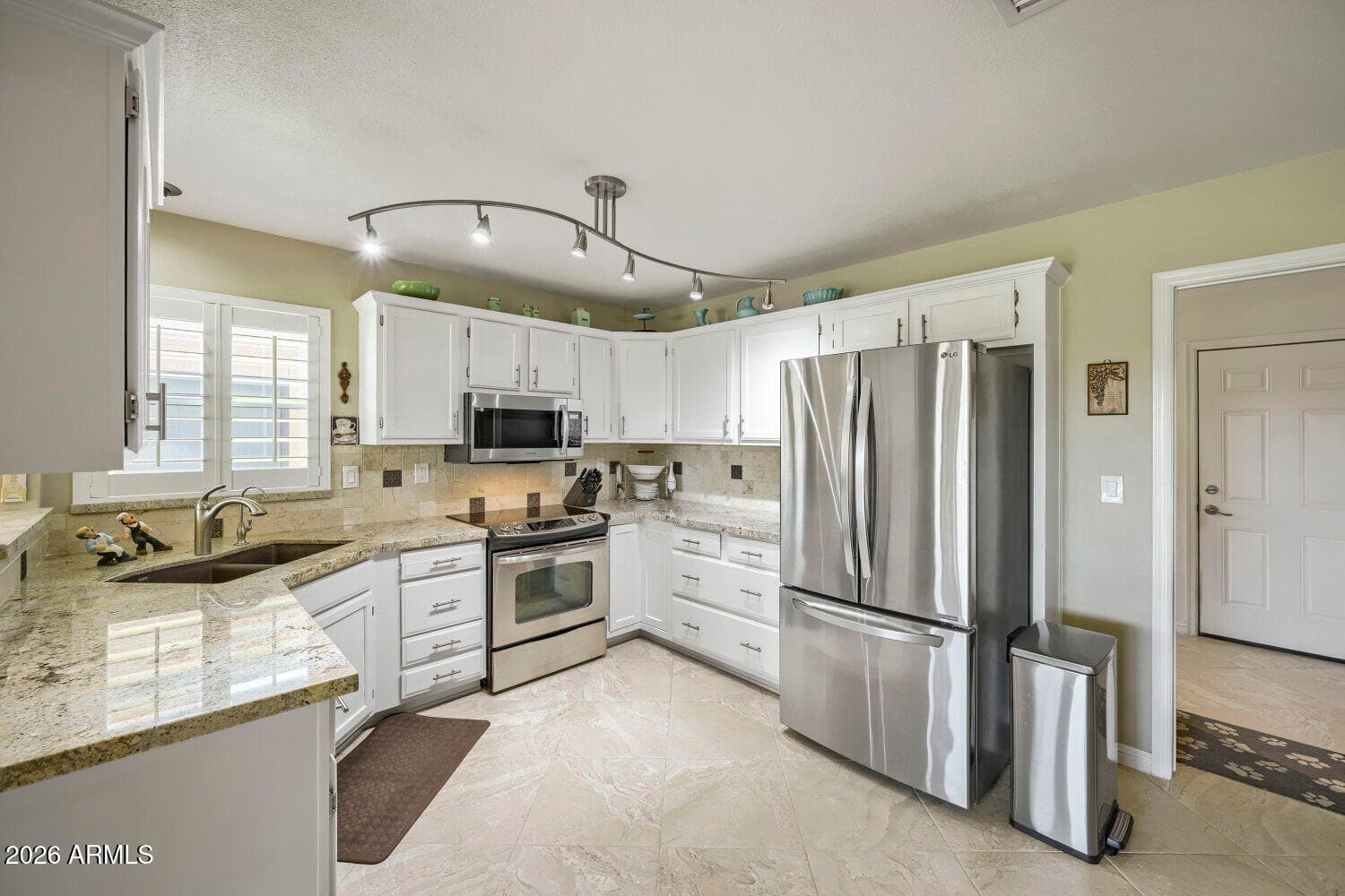 13031 W Peach Blossom Drive, Sun City West, AZ 85375 — photo 13 of 34