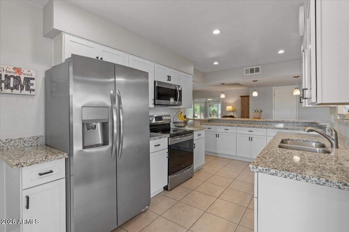 10895 W Clair Drive, Sun City, AZ 85351 — photo 4 of 26