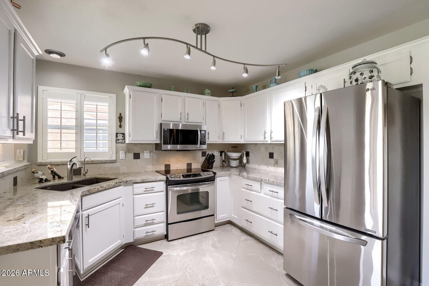 13031 W Peach Blossom Drive, Sun City West, AZ 85375 — photo 12 of 34